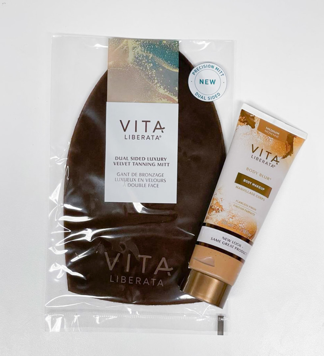 Shop products by Vita Liberata: Luxury Double Sided Tanning Mitt ($7), Body Blur ($39)